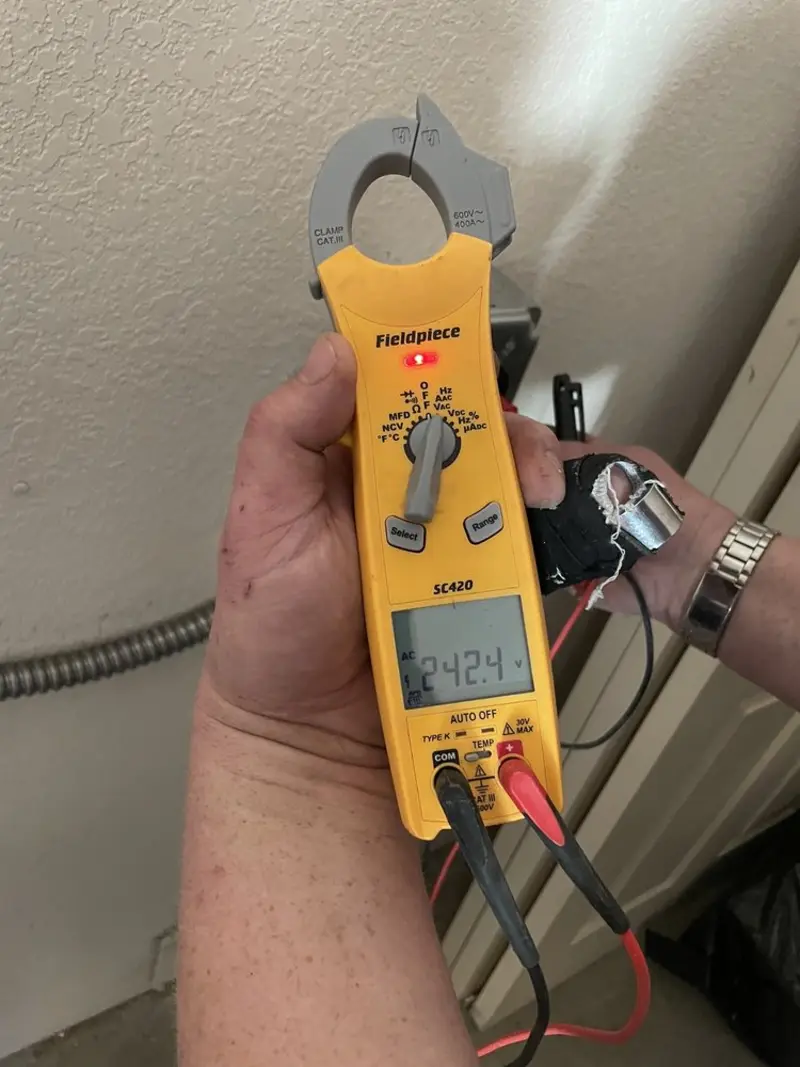 Voltage testing with clamp meter during Generator Installation in Almira